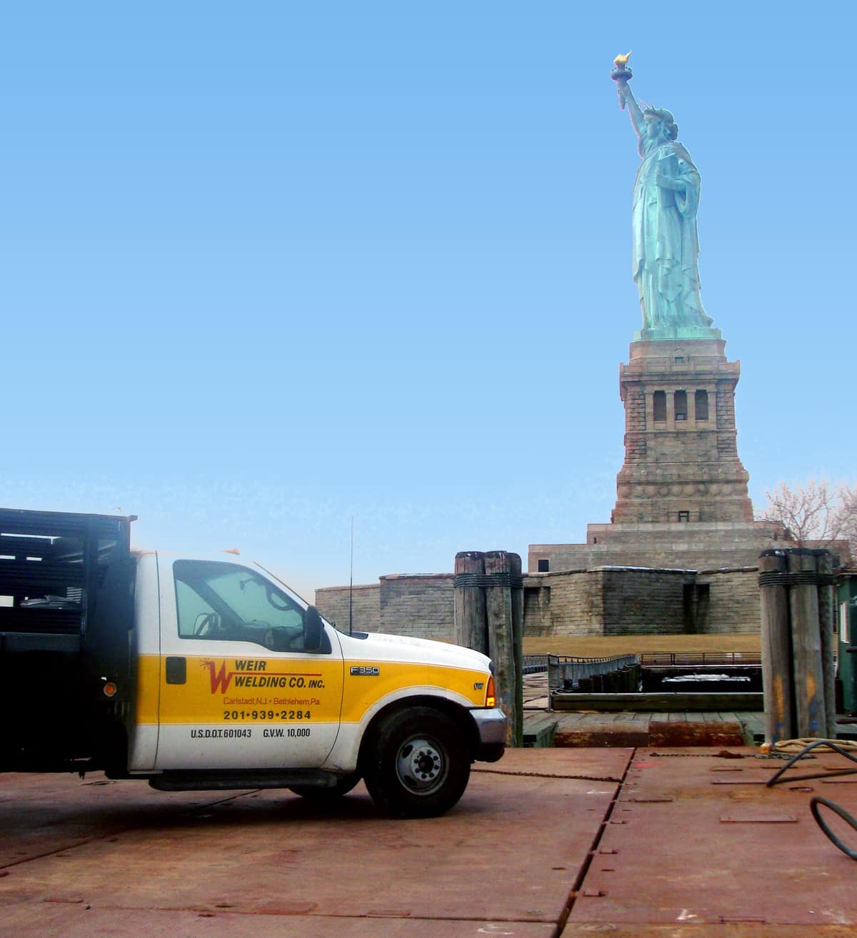 Weir Welding truck in front of the Statue of Liberty